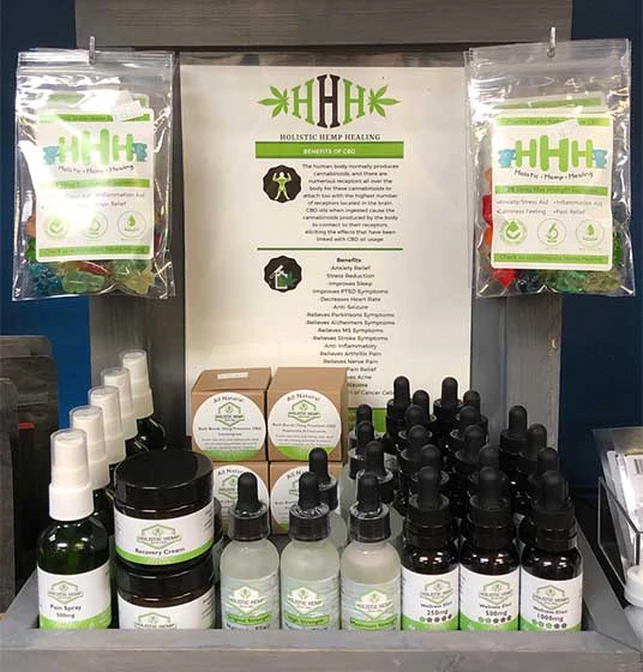 Holistic Hemp Healing product display that they provide to retailers of their CBD oils, creams, supplements, soap and more